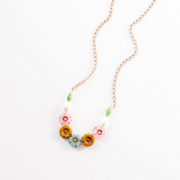 Dainty Pearl And Small Pastel Flowers In Pink And Blue