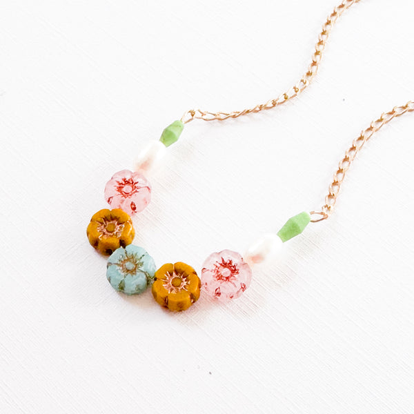 Dainty Pearl And Small Pastel Flowers In Pink And Blue