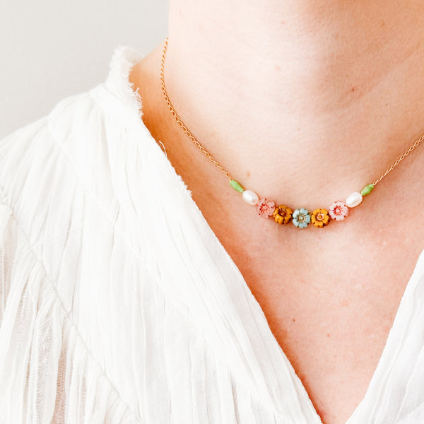 Dainty Pearl And Small Pastel Flowers In Pink And Blue