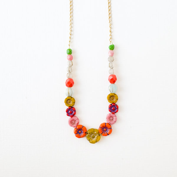 Dainty Bead And Flower Necklace With Tiny Pink Tassel