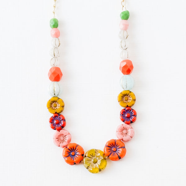 Dainty Bead And Flower Necklace With Tiny Pink Tassel