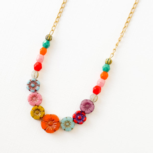 Dainty Bead And Flower Necklace With Tiny Orange Tassel