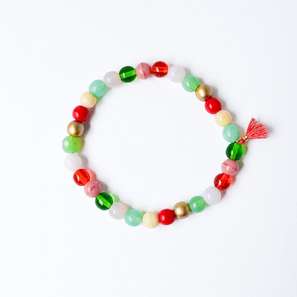 Build your own set of three Smooth Glass Bead Stretch Bracelets with Tassel