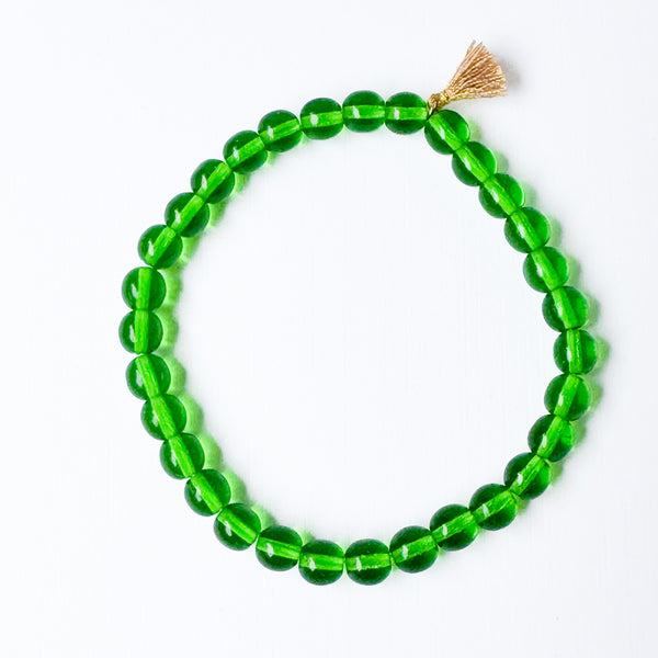 Build your own set of three Smooth Glass Bead Stretch Bracelets with Tassel