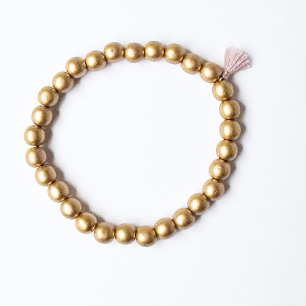 Build your own set of three Smooth Glass Bead Stretch Bracelets with Tassel