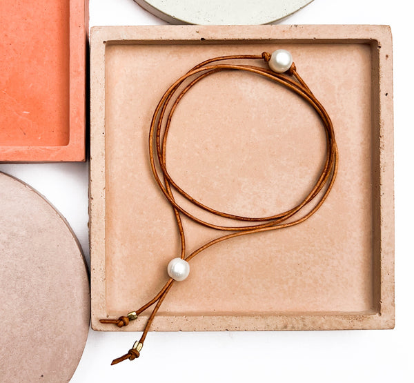 Pearl and leather wrap triple bracelet