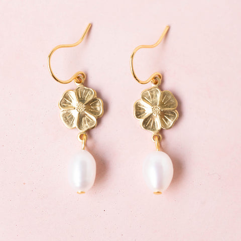Flower and dangle earrings