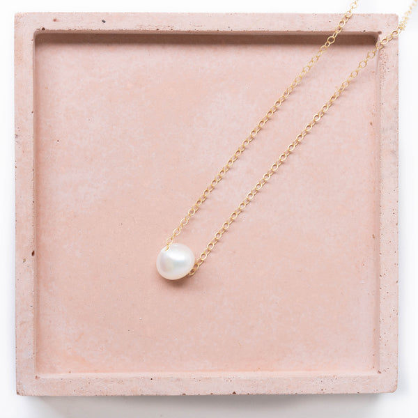 Single floating pearl